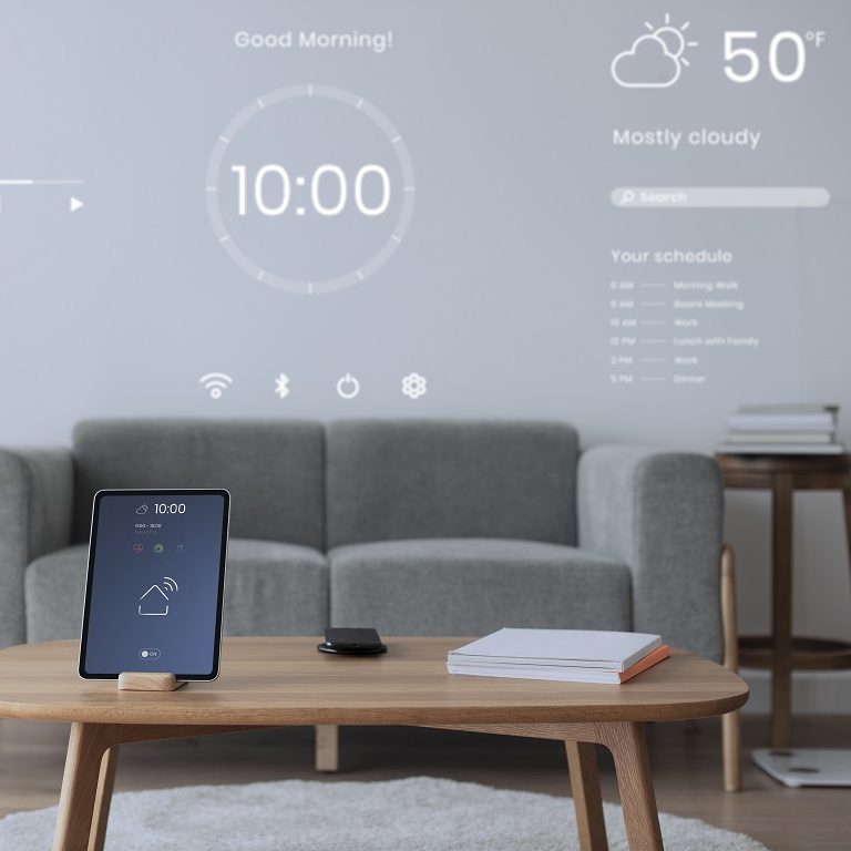 Digital tablet screen with smart home controller on a wooden table